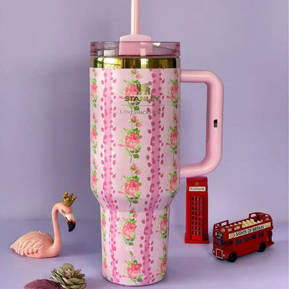 Stanley LoveShackFancy pink blossom floral quencher tumbler with handle and straw featuring romantic pink flowers and gold accents by Trendz Inn
