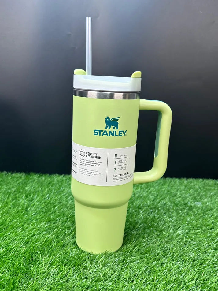 Stanley 40oz stainless steel tumbler with handle and straw – leakproof, vacuum insulated travel mug for hot and cold drinks available at Trendz Inn Pakistan.